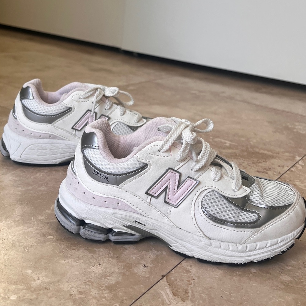 White and Silver Girls New Balance 2002R Sneakers with Pink Accents